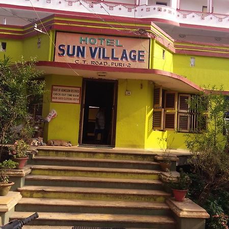 Hotel Sun Village Puri Bagian luar foto