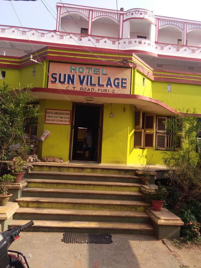 Hotel Sun Village Puri Bagian luar foto